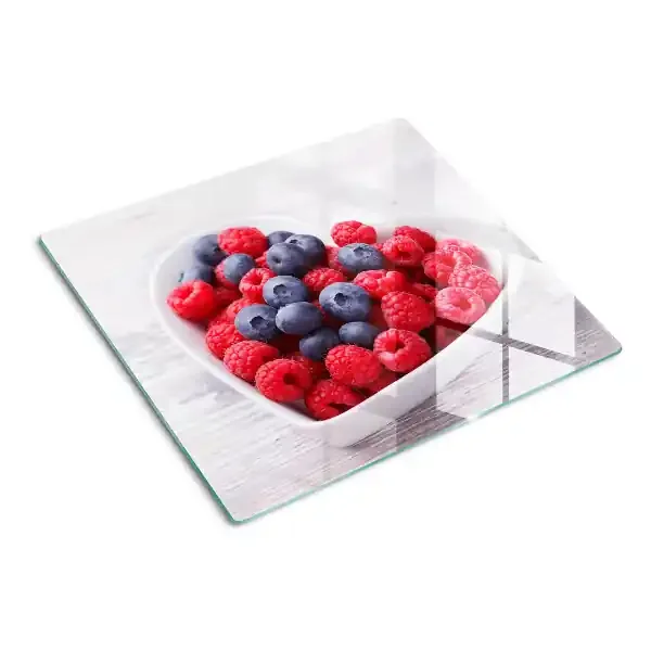 Tabla de cortar de cristal frutas en forma de corazón