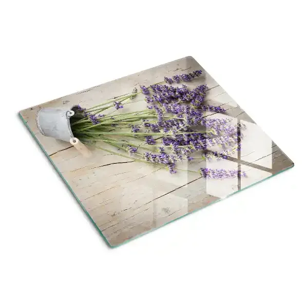 Tabla de cortar de cristal Lavanda en una maceta sobre un fondo de madera