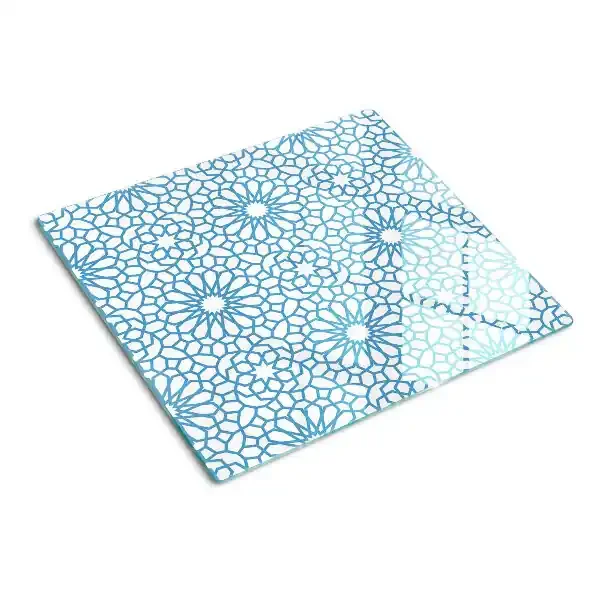 Tabla de cortar de cristal Motivo floral en tonos azules.