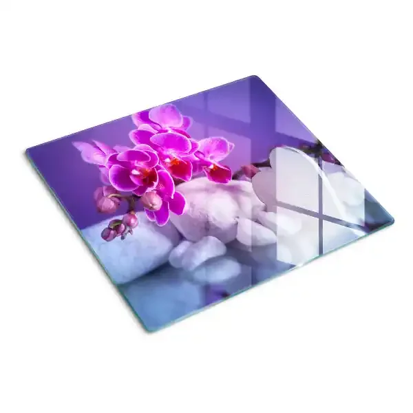 Tabla de cortar de cristal Orquídeas sobre piedras